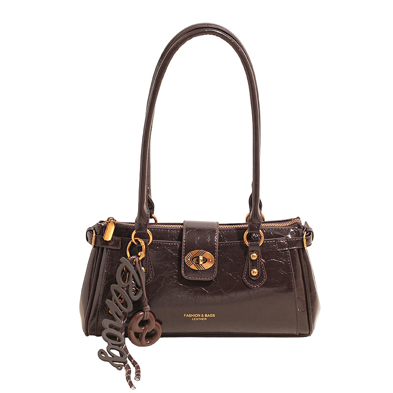 Bolsa de brazo de viaje coreano, bolso de cera retrógrada para mujeres, bolso de palo de piel de aceite 2025, nueva moda versátil bolso de hombro portátil