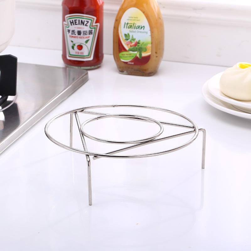 Fábrica directa 201 no magnético de acero inoxidable vapor de cocina aparatos de cocina engrosar el marco de vapor de tres patas olla de presión de vapor