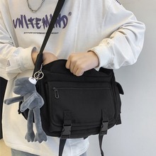 简约斜挎包男女ins日系大容量机能单肩邮差包工装风大学生背包男