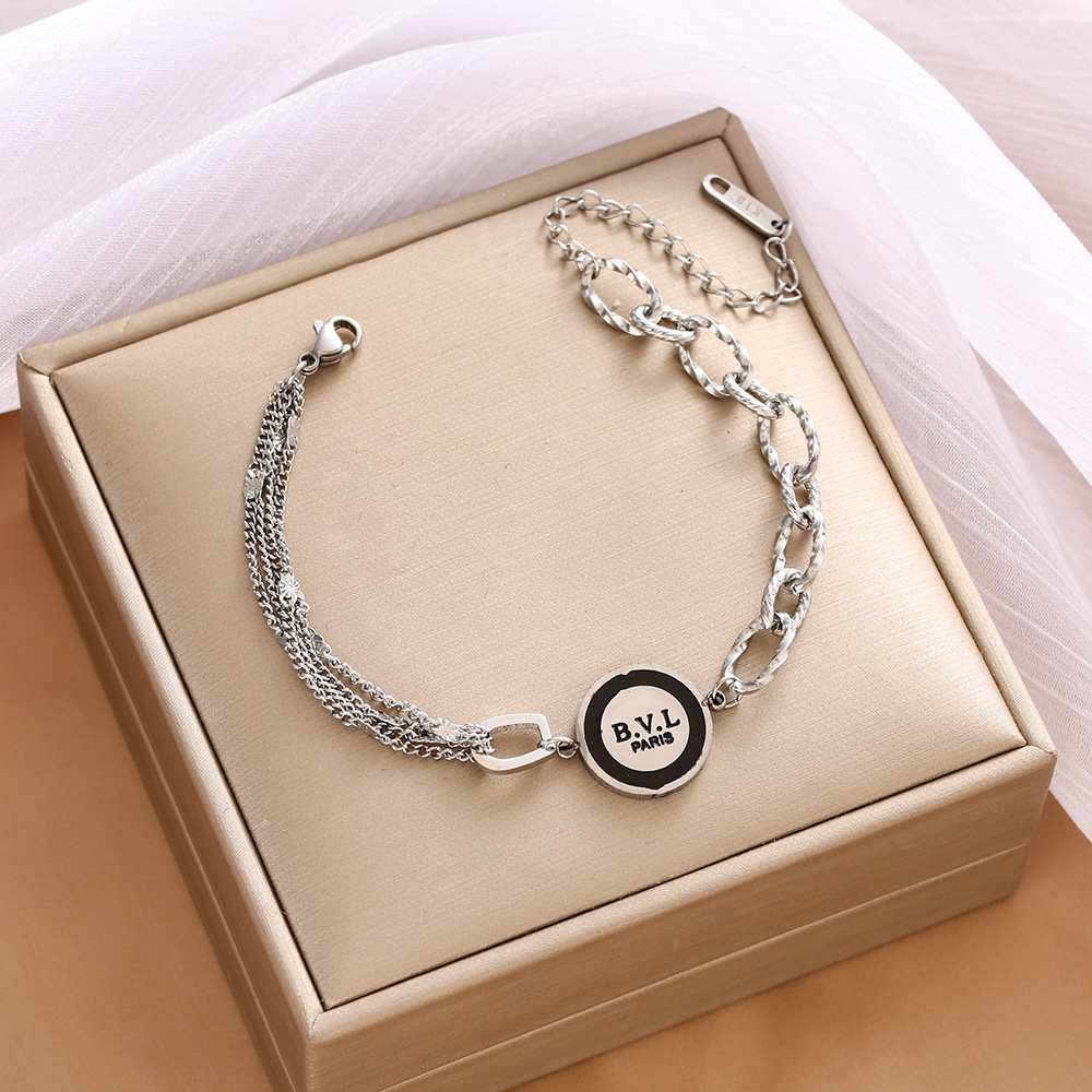 Pulsera de trébol de acero titanium vendedora caliente transfronteriza europea y americana con incrustaciones de concha pulsera colgante pulsera de diseño avanzado sin desvanecimiento al por mayor