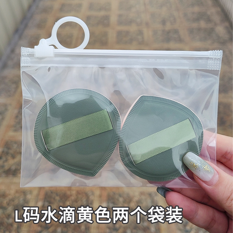 100分パフの木の大きいサイズのマシュマロのパフの空気感の乾湿の両用の粉の底液はエアクッションのパフを使います。|undefined