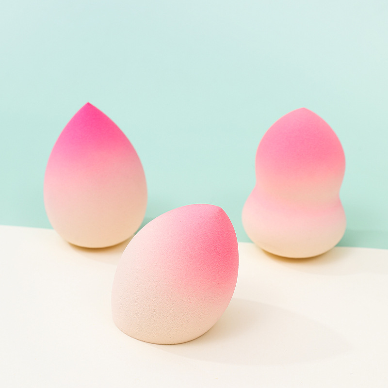 Fábrica personalizada de color degradado transfronterizo maquillaje de belleza soplo de huevo no come polvo no látex color spray gota de agua esponja de maquillaje de calabaza