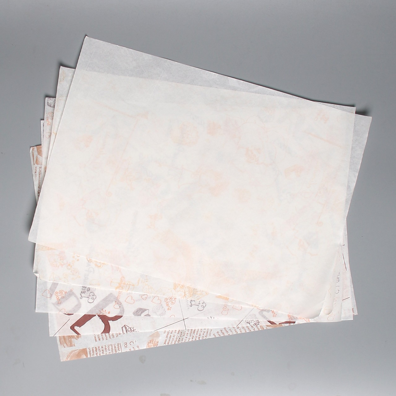 Papel de embalaje de hamburguesas de grado alimenticio desechable a prueba de aceite para hornear papel de almohadilla de papel de hamburguesas en stock