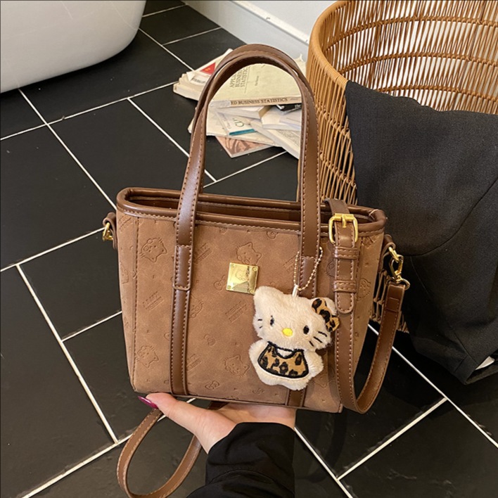 2025 otoño y invierno nuevo estilo simple de gran capacidad bolso de cubo portátil de mujer sensación de alta calidad bolsa de hombro casual bolsa de viaje mochila