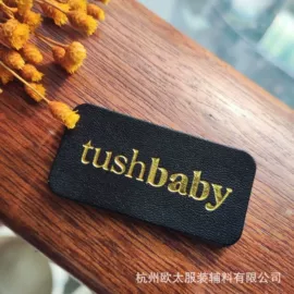 洗唛、商标;布贴;吊粒、吊牌