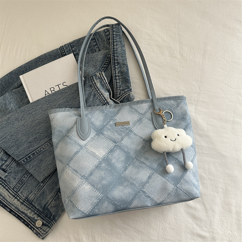 Casual retro bolso de gran capacidad para mujeres 2024 nueva moda moda bolso de hombro de tendencia de textura universal bolso de viaje