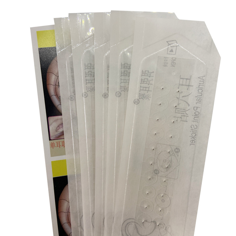 透明な耳はつぼの圧力を貼って、耳の穴を貼って玉を貼って石を貼って金の玉の銀の玉を貼って耳の穴の豆をマッサージして貼ります。