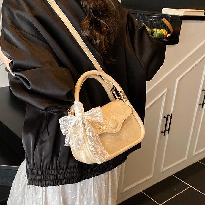 Bolso cuadrado pequeño estilo explosivo único exterior para mujer 2025 nuevo bolso de mensajero simple de color en contraste cuero de cera de aceite bolso de hombro todo fósforo de nicho