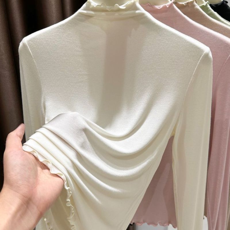 Soft and comfortable half-turtleneck base layer for women, thin and slim-fit, autumn and winter modal top with ruffled trim Soft and comfortable half-turtleneck base layer for women, thin and slim-fit, autumn and winter modal top with ruffled trim
