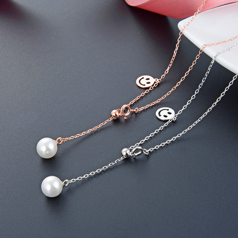 Japonés simple personalidad emoticon feliz cara sonriente colgante clavícula S925 rosa de plata dorada collar de perlas para mujeres