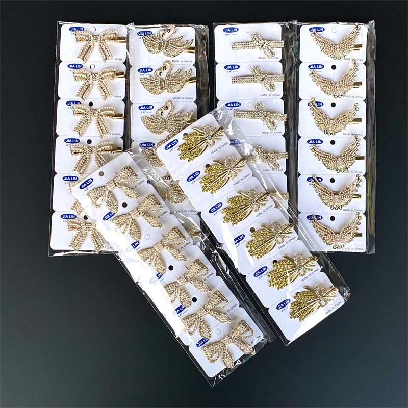 Venta caliente de aleación de oro de diamante incrustado horquilla de pico de pato clip de presión clip de dos yuanes tienda de accesorios para el cabello accesorios para la cabeza puesto de suministro