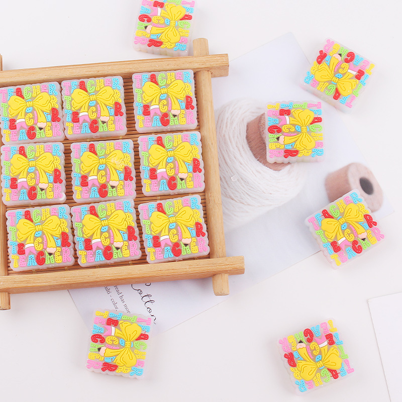 Productos para bebés cuadrados arco de goma de diente DIY creativo baby molar chupeta anti-caída accesorios de cadena