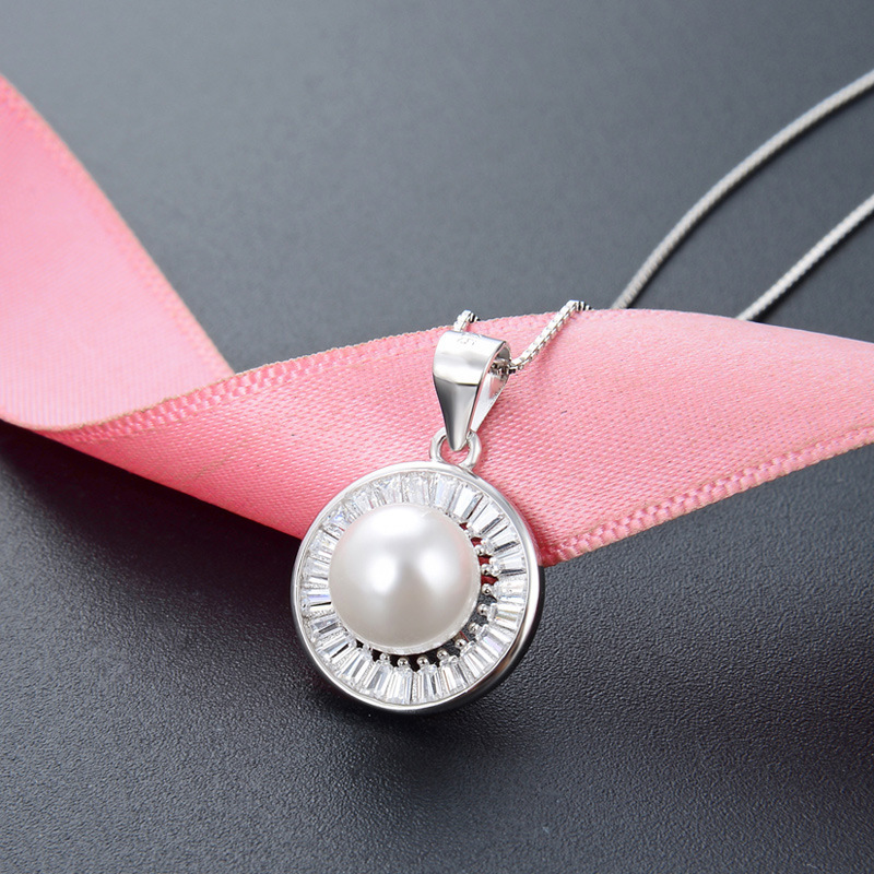 S925 colgante de perlas de diamantes de círculo de plata temperamento de moda femenino de alto nivel de lujo ligero colgante de plata colgante de un cabello