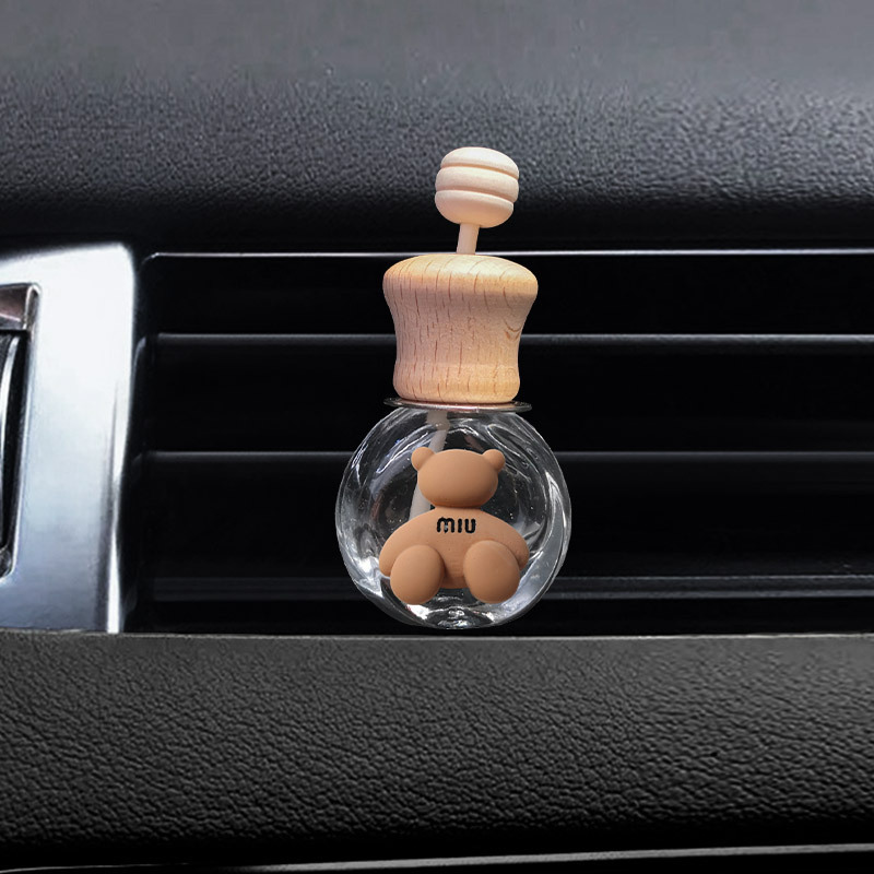 Red de la red color té leche dibujos animados coche salida de aire botella de perfume creativo lindo coche decoración de aromaterapia accesorios de coche