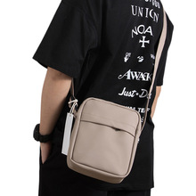 潮流男女手机包多功能单肩包跨境新款胸包男士斜挎包皮革材质方包