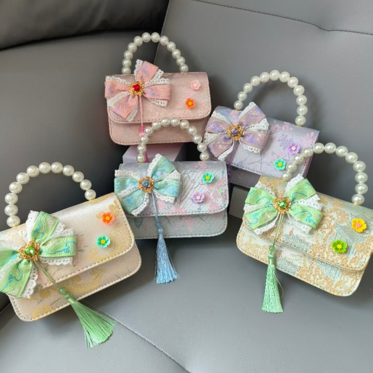 Bolsa portátil de la princesa de perlas estilo nacional arco de hombro bolso de cadena bolso pequeño bolso de cambio de Año Nuevo