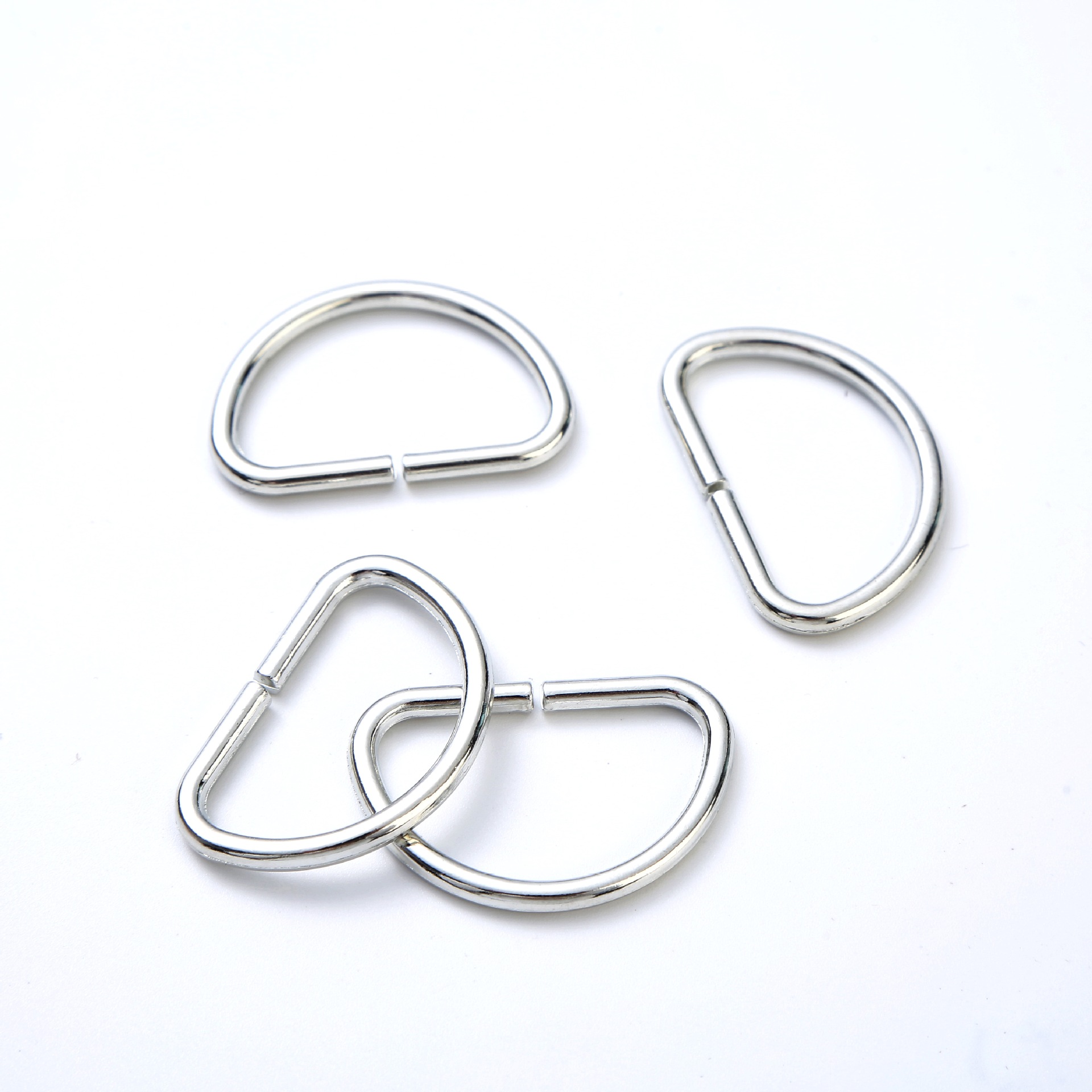 Suministro directo de fábrica accesorios de equipaje metal hebilla de tipo D bolsa de aleación hebilla en forma de D ropa D hebilla