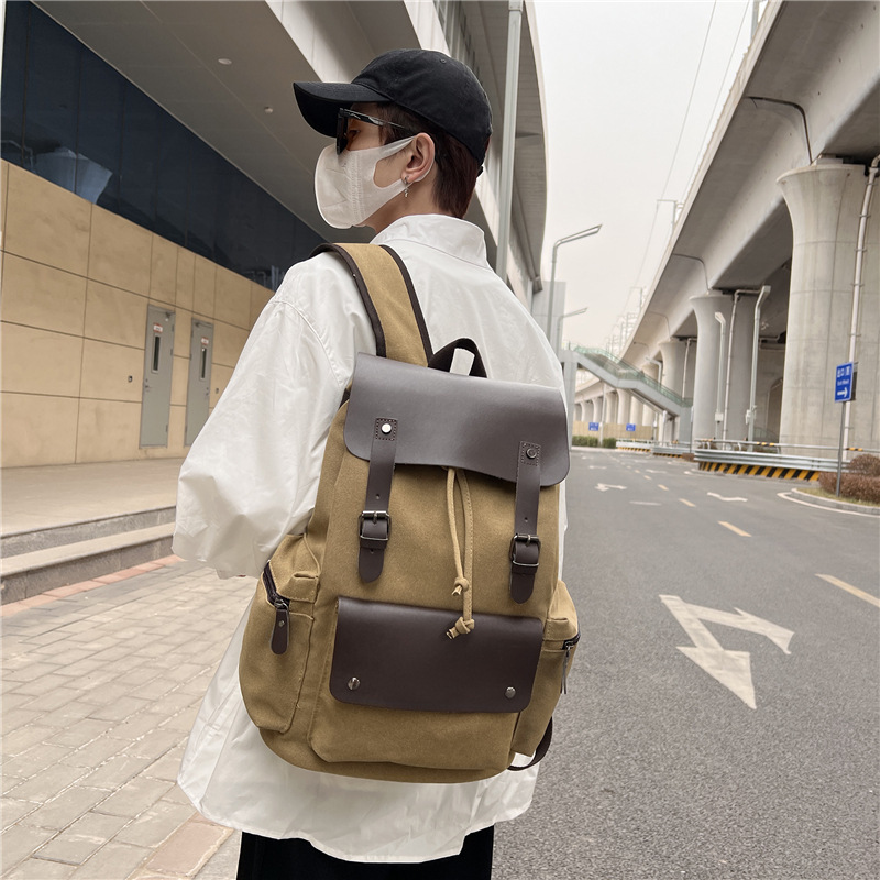 Mochila de lona vintage personalidad de moda de viaje de negocios bolsa de computadora de cuerda de tracción mochila al por mayor