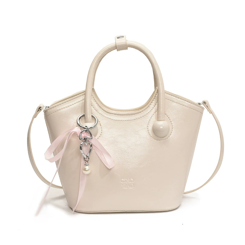 Compact summer handheld small bag, city style, top handle and shoulder strap, with/without pendant