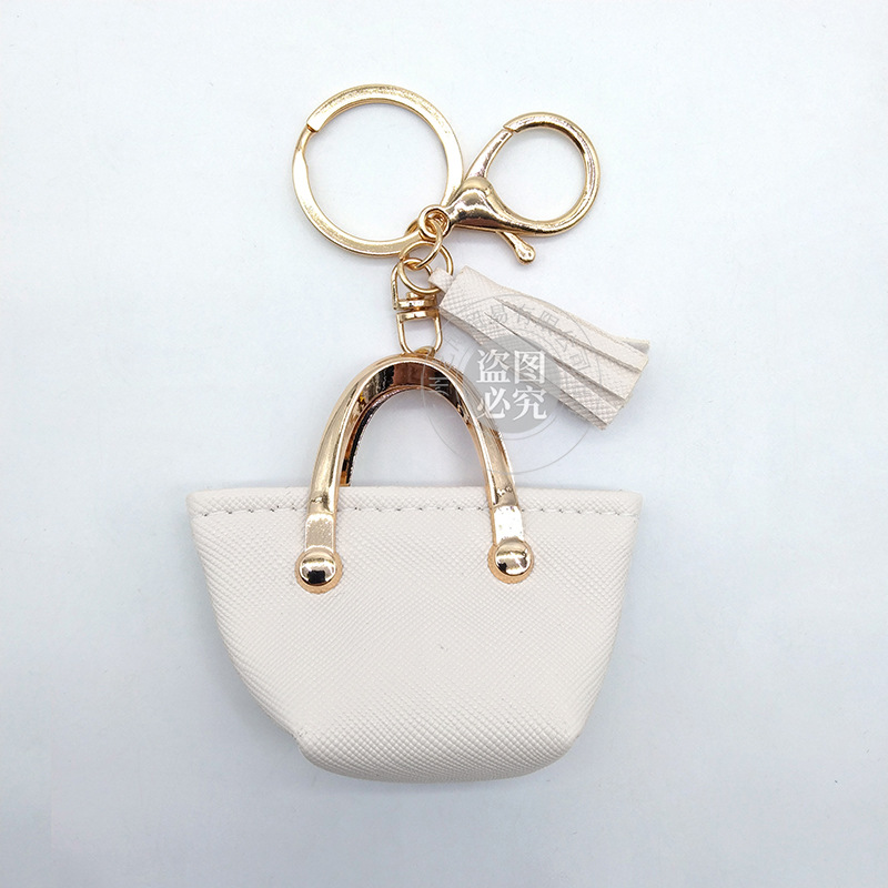 Llavero para mujer, bolso, colgante, joyería, mini monedero de almacenamiento de cuero lindo europeo y americano image 7