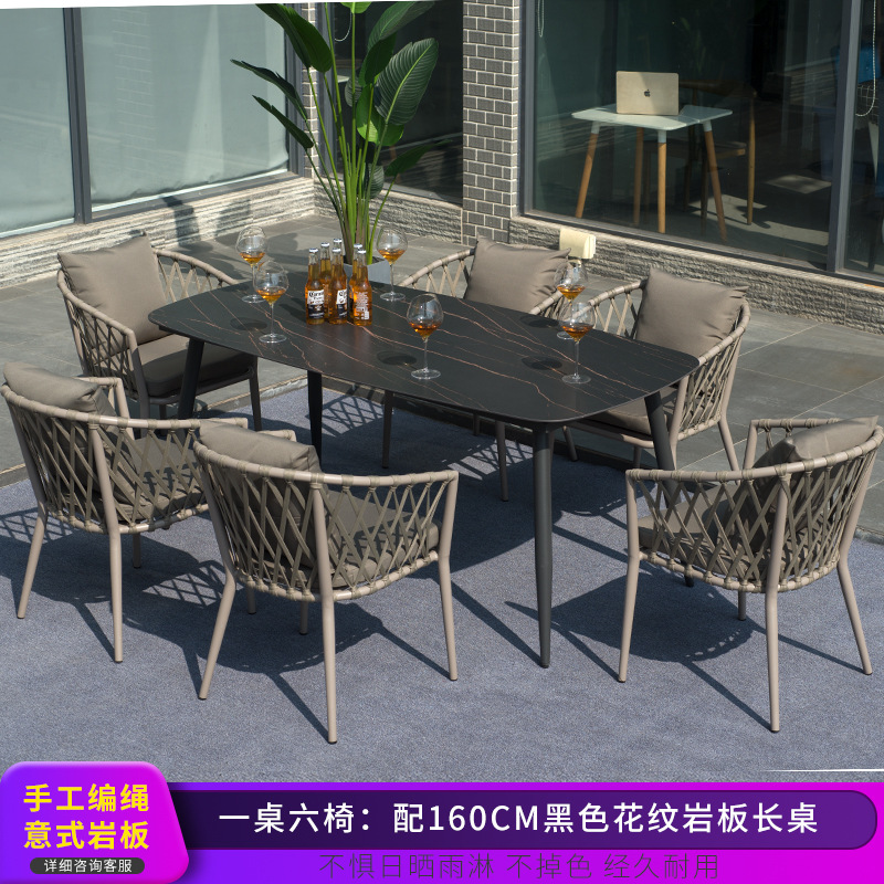 Conjunto de mesa y sillas para exteriores, mesa y sillas de comedor de ratán para patio de villa, conjunto de tres piezas de silla de ratán para balcón nórdico, muebles sencillos, material de ratán.