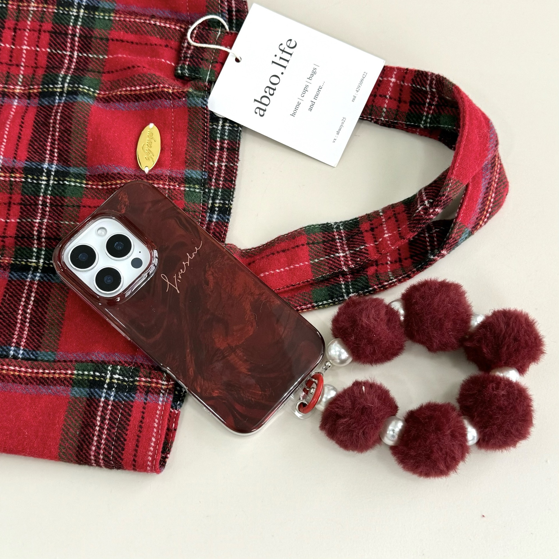 Cadena de perlas de felpa mancha roja en inglés ej