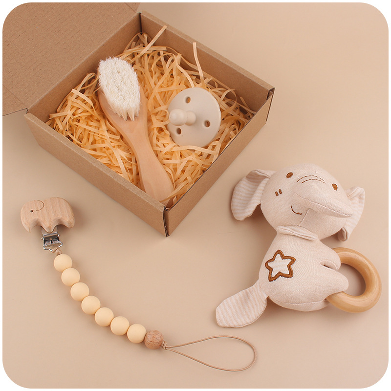 Nuevo bebé de dibujos animados León sonajero mordedor calmante bebé DIY creativo cepillo pezón Cadena de cuatro piezas conjunto