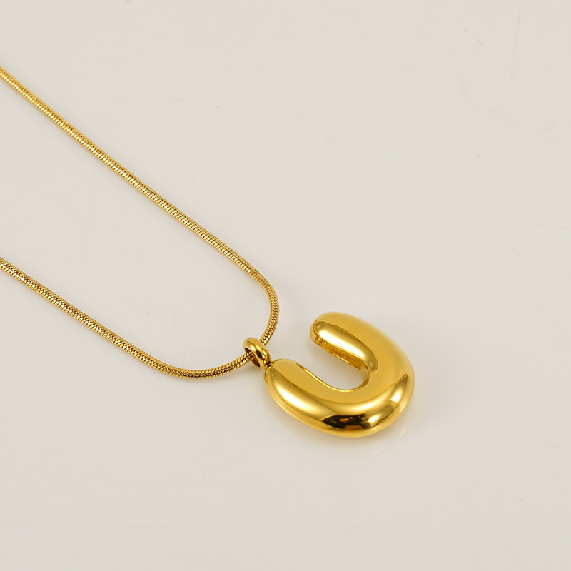 Burbujas transfronterizas 26 letras inglesas colgante brillante collar nicho universal oro acero titanio joyería collar