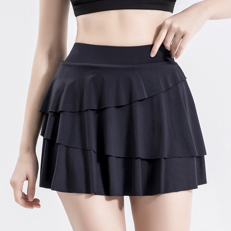 Yoga deportivo pantalones cortos sueltos falsos dos piezas de falda anti-descalzada secado rápido correr entrenamiento tenis pastel pantalones