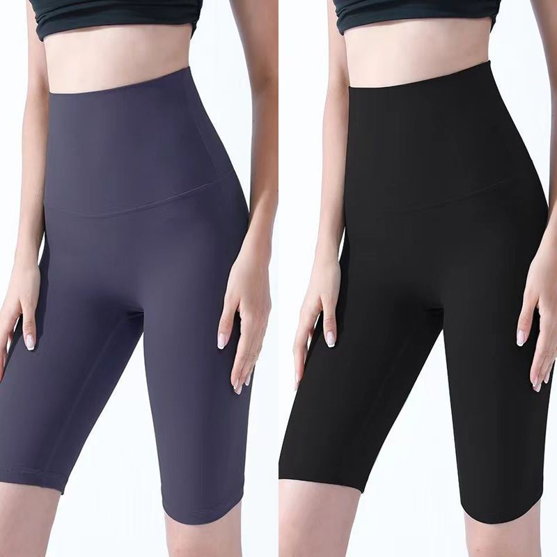 Pantalones cortos desnudos de mujer elásticos apretados para elevar las caderas de cinco puntos pantalones deportivos de secado rápido succión de sudor entrenamiento para correr fábrica de comercio de ping