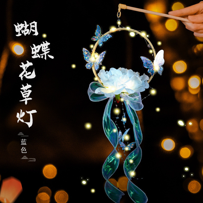 中秋の提灯の祭り用品は発光の花灯を持っています。|undefined