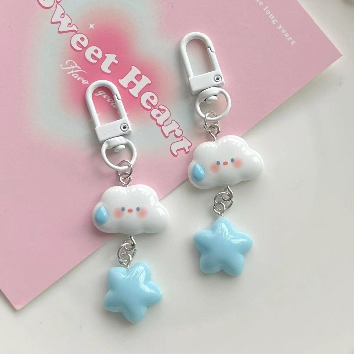 Expresión silenciosa de dibujos animados estrella serie llavero nube DIY creativo pequeña joyería estudiante novias regalo colgante