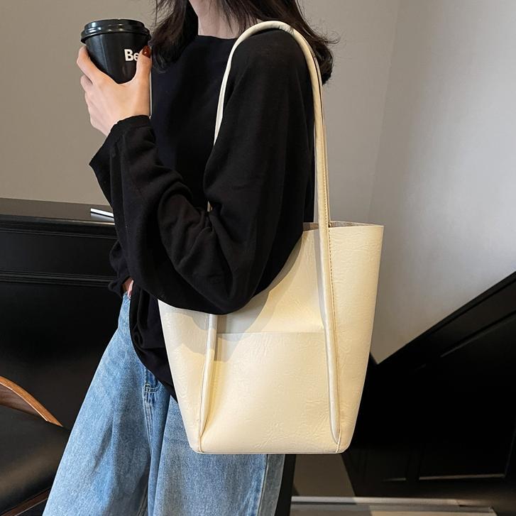 Bolsos de balde transfronterizos para niños 2024 nuevos bolsos de mujer de alto nivel retro bolsos de hombro bolsos de mano simples casuales