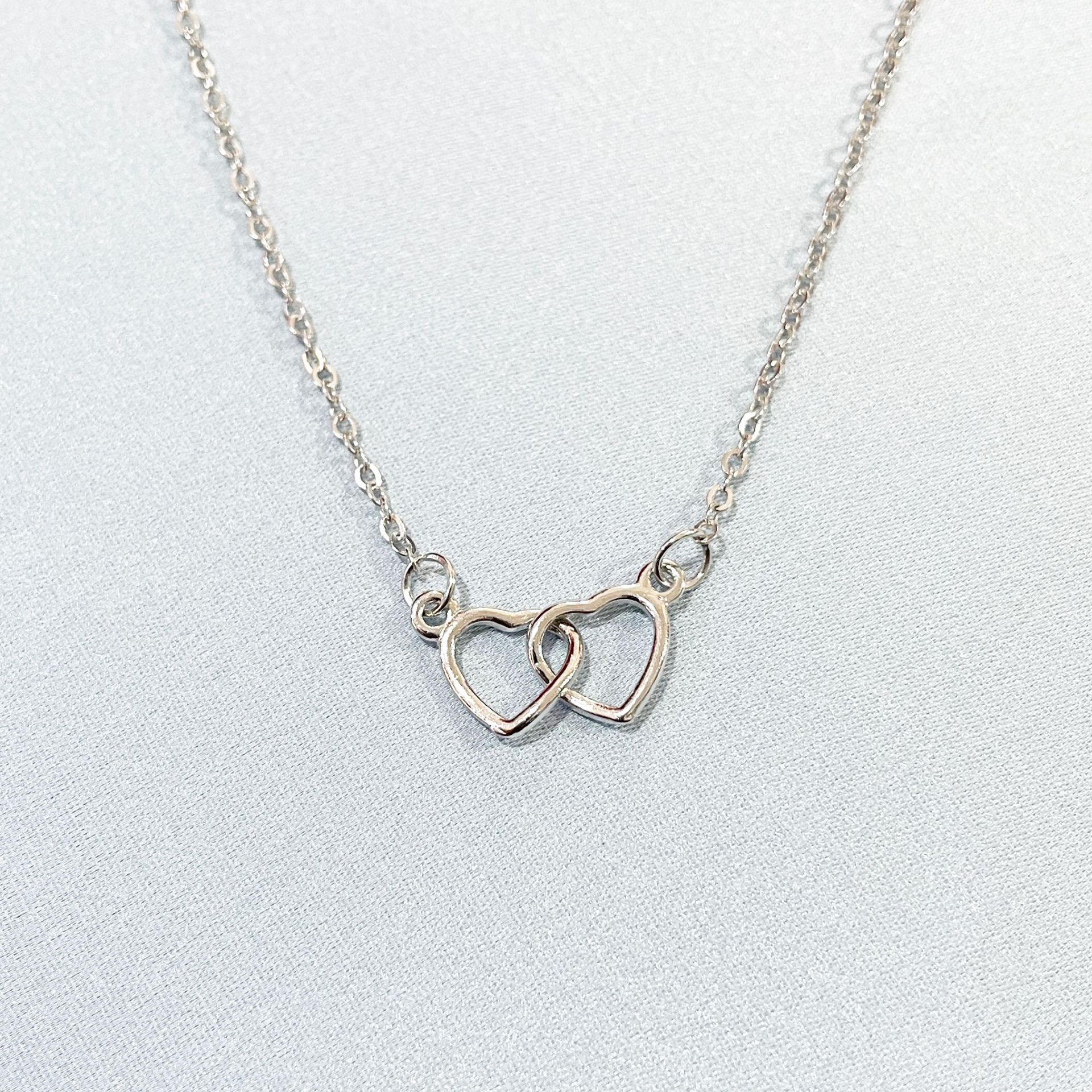 INS Internet celebridad estilo corazón a corazón impreso de plata de moda y hermosa Cadena de clavícula pequeña y elegante joyería amor clavícula collar