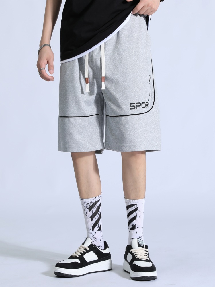 Logotipo personalizable, venta directa del fabricante, pantalones de verano holgados de cinco puntos, pantalones deportivos casuales a la moda para adolescentes.