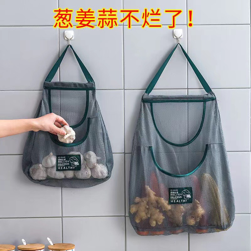 果物と野菜の収納ネットの袋の台所の収納袋は袋の壁に掛けます。|undefined