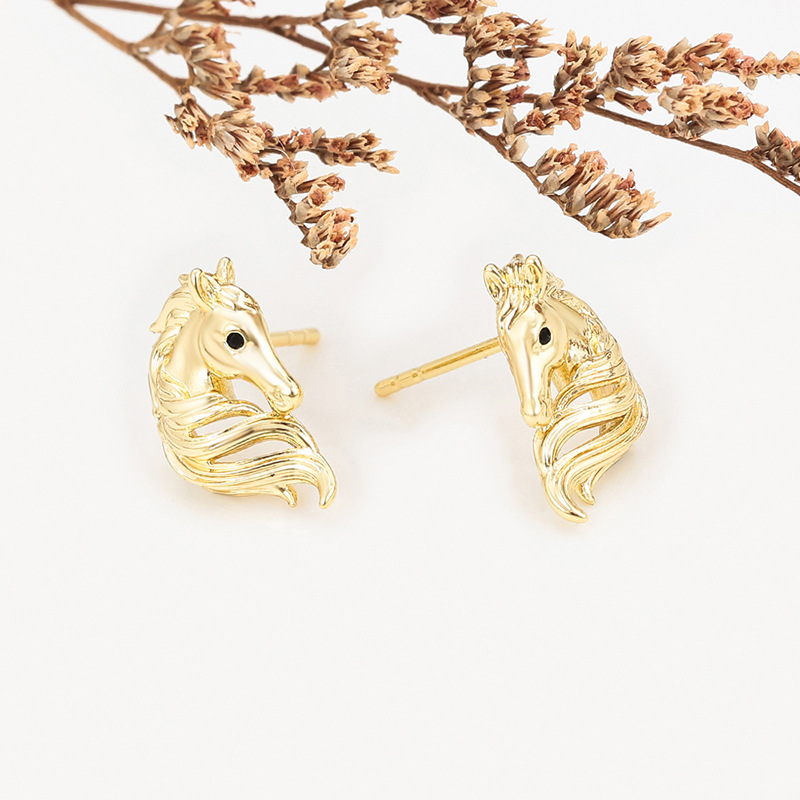 Xuping joyería moda simple año del caballo nuevo perno de nicho diseño personalidad temperamento orejas de aleación de cobre al por mayor mujeres