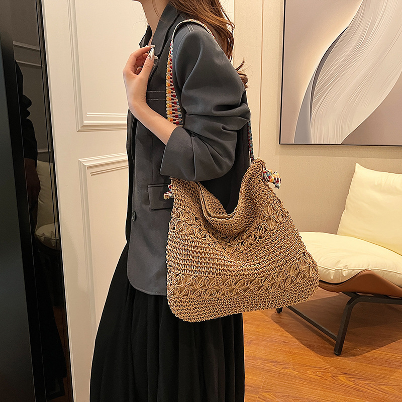 Bolsa de tejido a mano para mujeres 2024 nueva bolsa de hombro de vacaciones de playa de marea de gran capacidad para viajar bolsa de paja