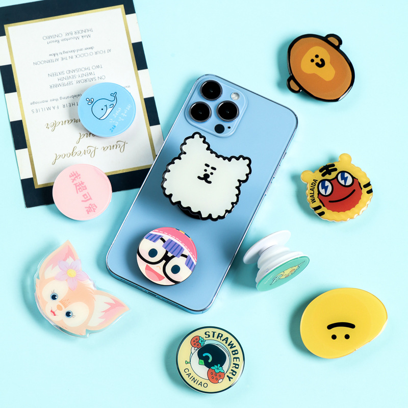 Soporte de airbag acrílico de forma alienígena al por mayor encantador alrededor de las estrellas de dibujos animados soporte de teléfono móvil en stock DIY