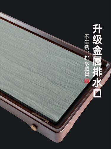 A charming ceramic-like design, this household drainage-style bamboo tea tray features a simple rectangular shape, made of basalt stone, serving as a dry-brew tea station.