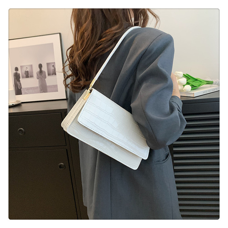 Minimalistisk stil for kvinner med minoritetstekstur under armene 2023 sommer ny håndholdt vestlig liten firkantet veske_voghion.com