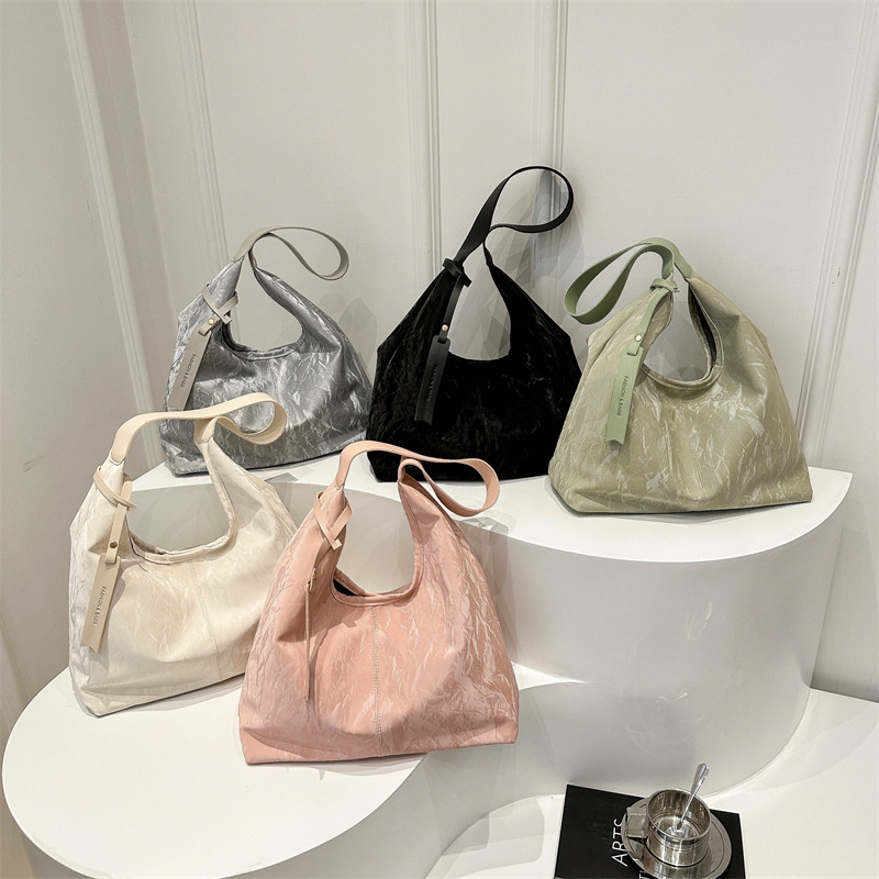 Bolsa de estilo extranjero para mujeres, primavera y verano 2024, nueva bolsa de hombro de dama versátil, bolsa de estilo coreano de alta calidad para mujeres