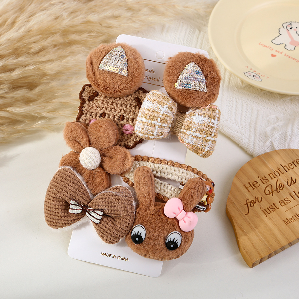 Otoño y invierno dibujos animados adorables clips para el cabello para niños dulce viento arco conejo conjunto de ocho piezas frangeas rotas clips para el cabello