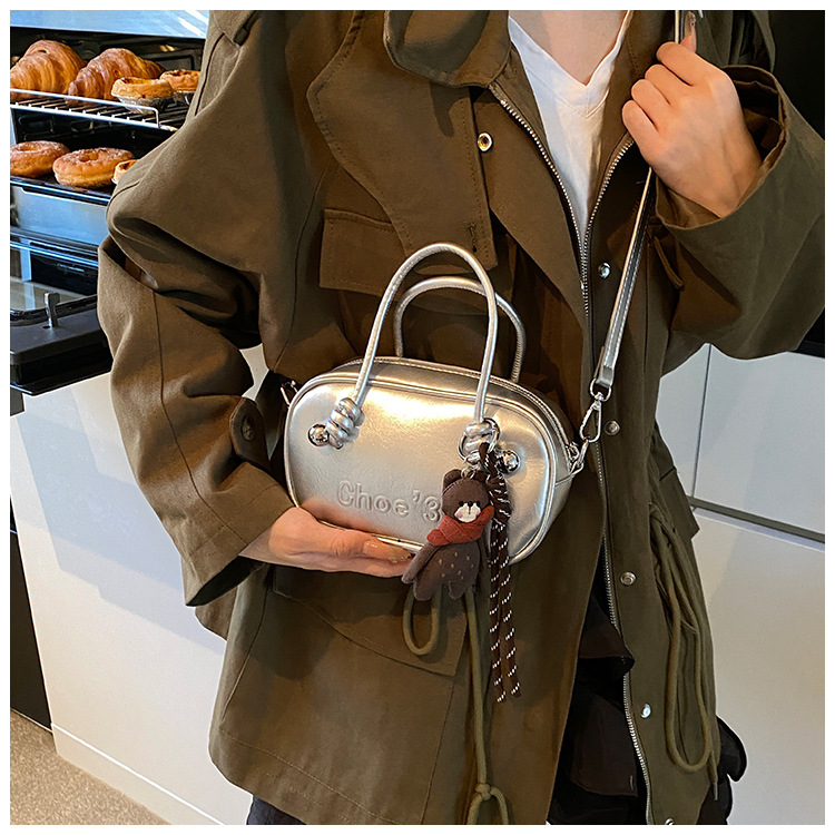 Retro soft leather solid color pillow bag for women, 2025 new trendy and fashionable single-shoulder crossbody bag, versatile hand-held bowling bag undefined