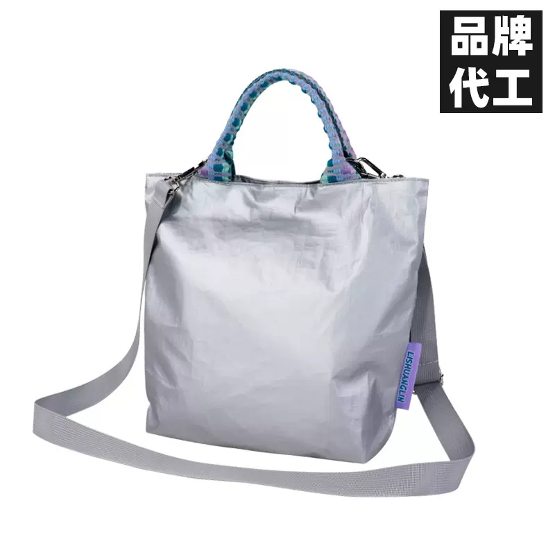 定制斜跨手提托特包2025新款女士单肩邮差包编织肩带轻便通勤拎包