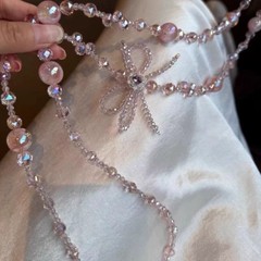 粉色超仙蝴蝶结串珠手机挂绳女轻奢甜美斜可背带手机挂链包包链条