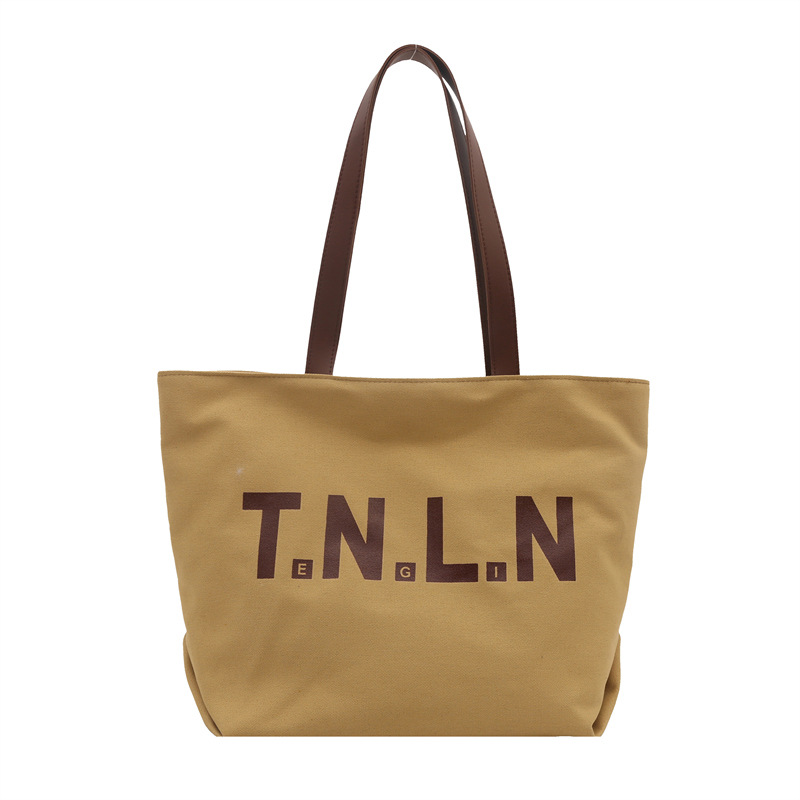 Bolsa de lona de gran capacidad para mujeres 2025, primavera y otoño, nueva literatura y moda, bolso de hombro, letras casuales, bolso de viaje