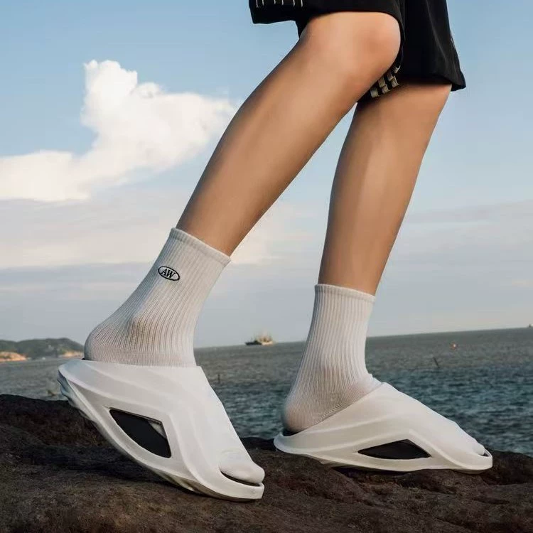 Сломанный кокон серии тапочки женский 2025 новый летний тренд мужская спортивная буксировка на открытом воздухе пляжные сандалии