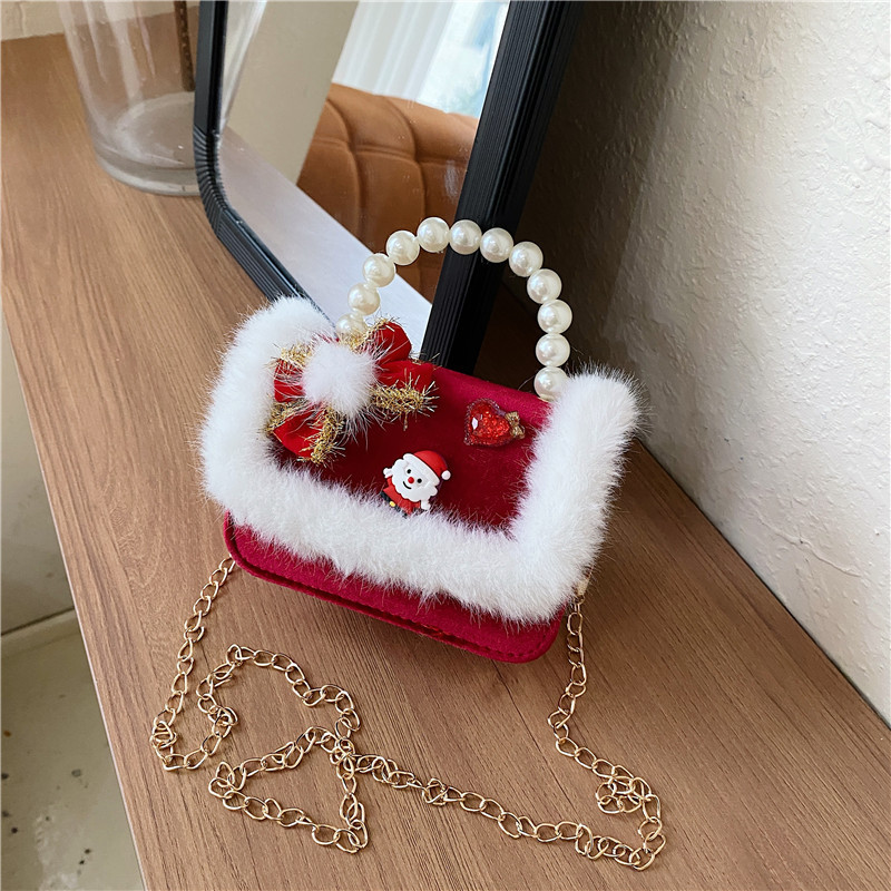 Mini moda para niñas bolso de cambio de perlas 2024 nuevo patrón de moda coreana bolso de ropa infantil