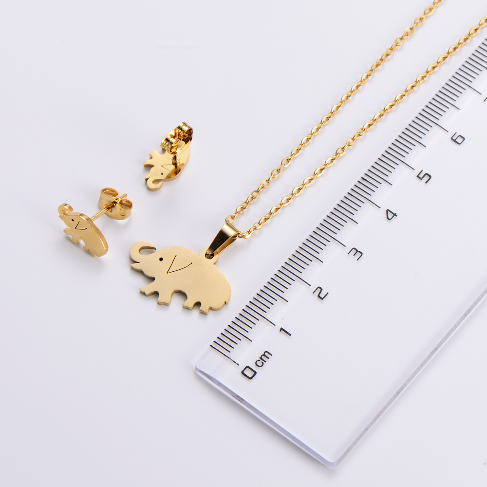 Titanium steel plating 18k gold elephant pendant necklace earrings set wholesale Nihaojewelry